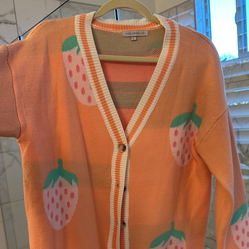 Miss Sparkling, Peach Strawberry Cardigan Size Large. Worn once.